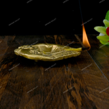 Brass Diya Placed in Welcoming Hand