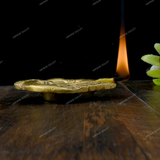 Brass Diya Placed in Welcoming Hand