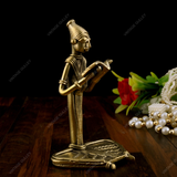 Handmade Brass Dhokra Reading Craftsman