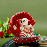 Enamelled Metal Ganesha Idol Seated in A Sea Shell - Red