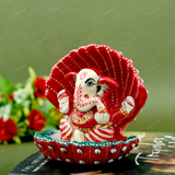 Enamelled Metal Ganesha Idol Seated in A Sea Shell - Red