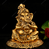 WHITE METAL GOLDEN GANESHA WITH PIPADI