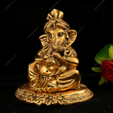 WHITE METAL GOLDEN GANESHA WITH PIPADI