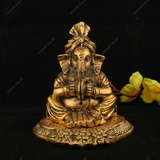 WHITE METAL GOLDEN GANESHA WITH MANJIRA