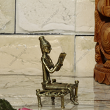 Brass Dhokra Lady Reading On Bed