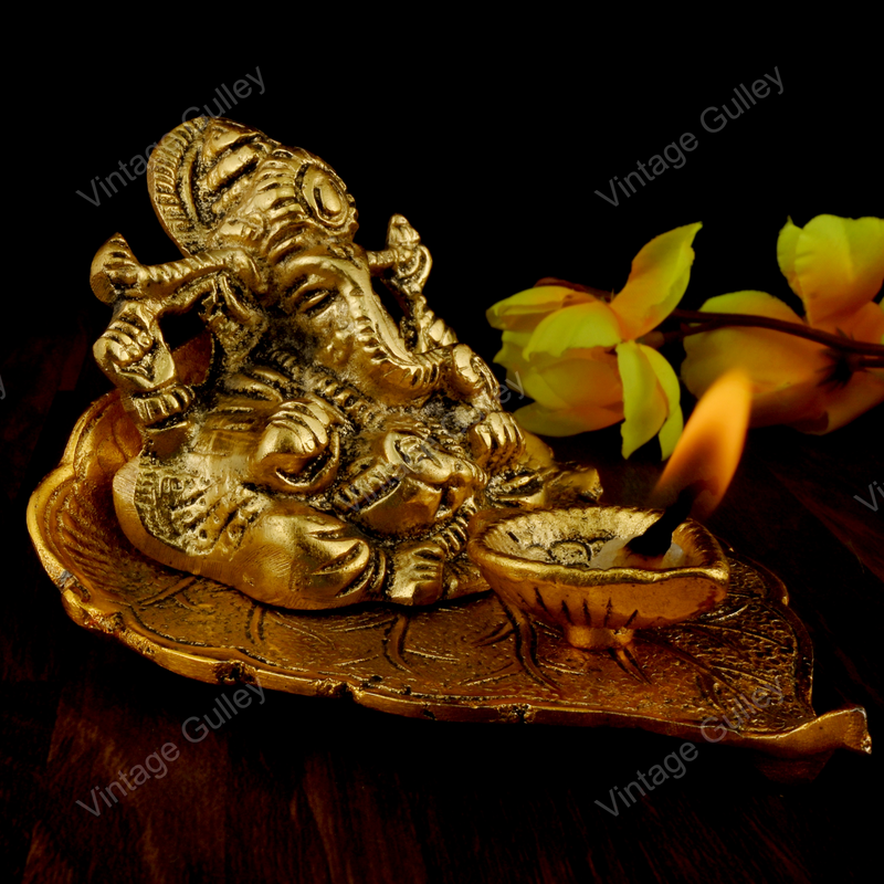 White Metal Golden Oxidized Peepal Patta Ganesha with Diya