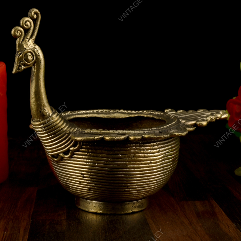 Brass Dhokra Candle Stand with Peacock Design