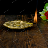 Brass Diya Placed in Welcoming Hand
