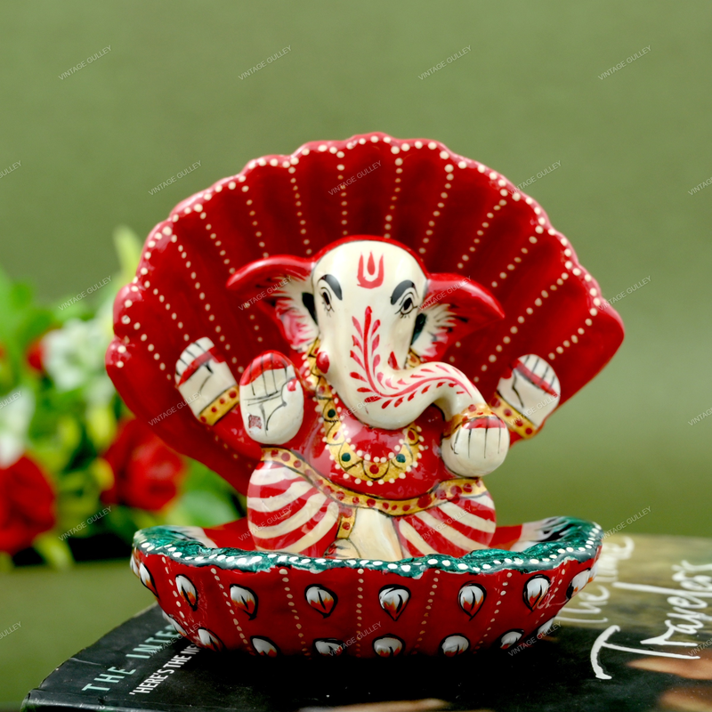 Enamelled Metal Ganesha Idol Seated in A Sea Shell - Red