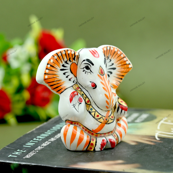 Enameled Metal Appu Ganesha Idol - 2 Inches - White & Orange