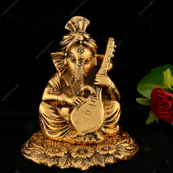 White Metal Golden Ganesha with Veena