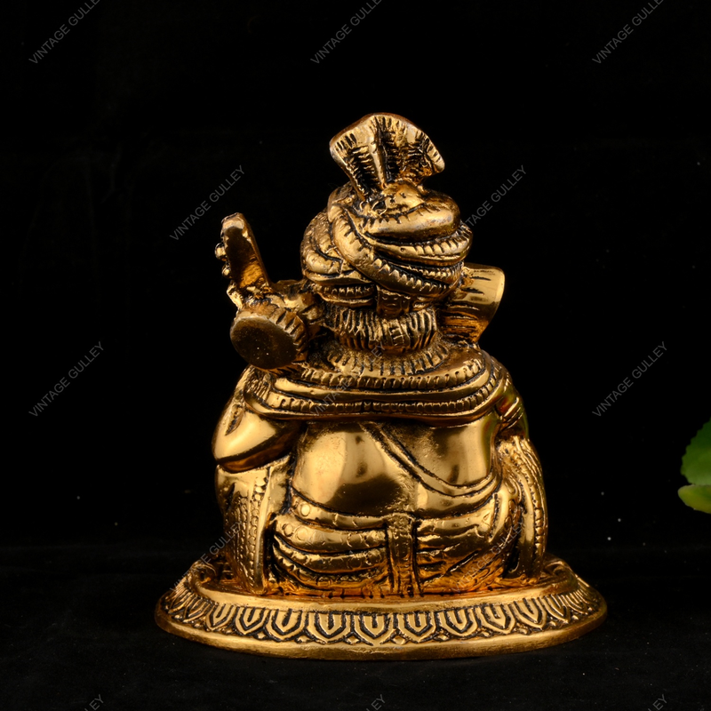 White Metal Golden Ganesha with Veena