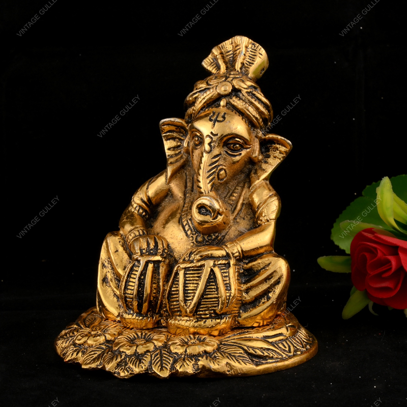 White Metal Golden Ganesha with Damru