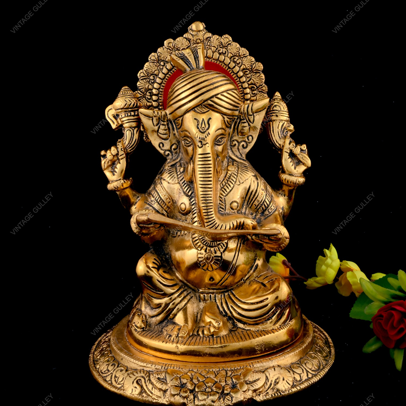 Metal Reading Ganesha Idol for Home Decor