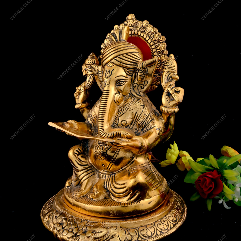 Metal Reading Ganesha Idol for Home Decor