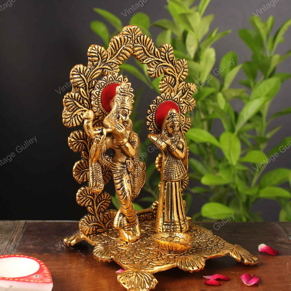 Metal Lord Radha Krishna Idol with Diya Golden Finish