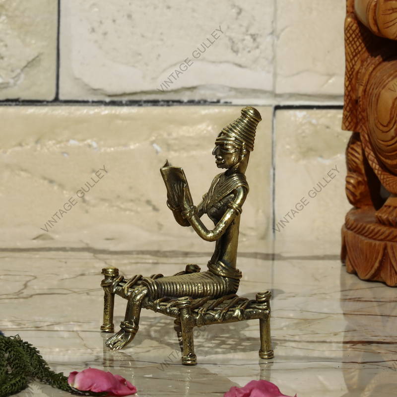 Brass Dhokra Lady Reading On Bed